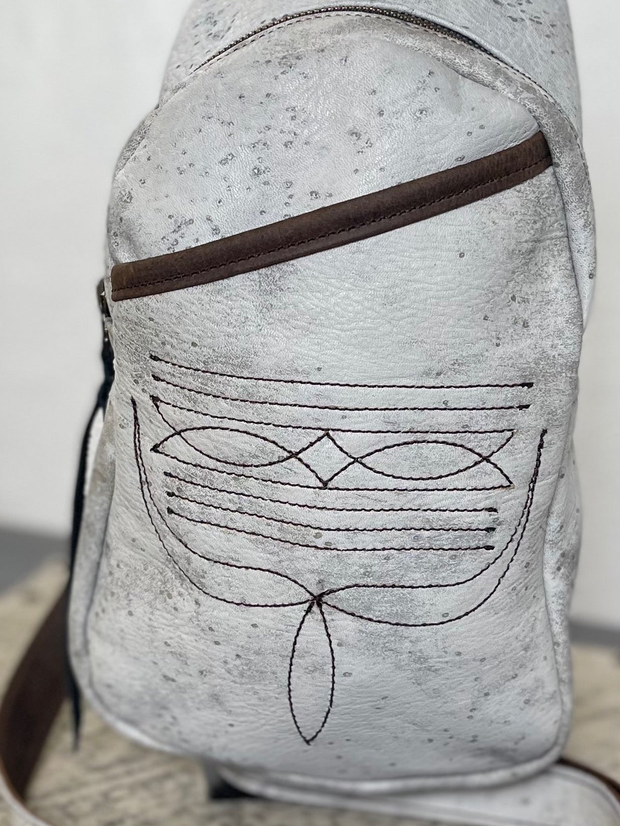 Boot Stitched Gray Leather Sling Bag